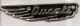 DU 33  ADESIV0 DUCATI ALANERA in metallo cromato e smalto nero(prezzo singolo)